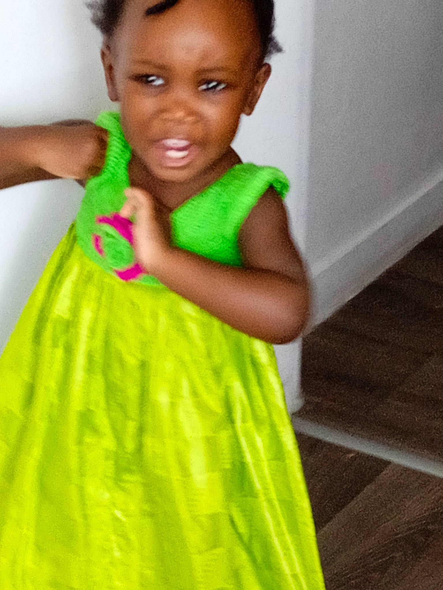 Maëva a rejoint le concours — aidez-le/la à gagner de superbes lots ! baby_toddler_clothing, day_dress, dress, embellishment, face, facial_expression, fashion_design, formal_wear, fun, green, hair, hairstyle, happy, long_hair, magenta, one_piece_garment, person, shoulder, skin, sleeve