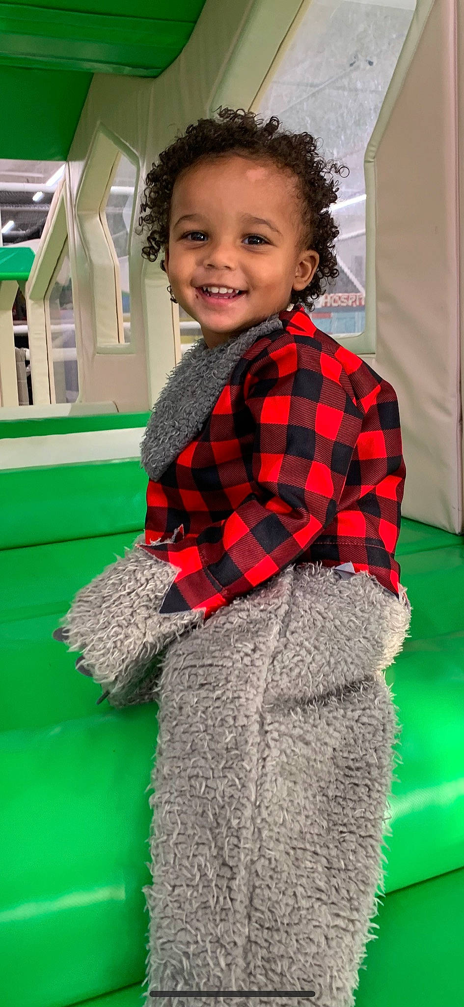 Dominick is registered to the contest to win money with this photo: beauty, child, collar, denim, dress_shirt, fun, hair, happy, joy, leisure, pattern, person, plaid, red, sleeve, smile, standing, street_fashion, t_shirt, tartan