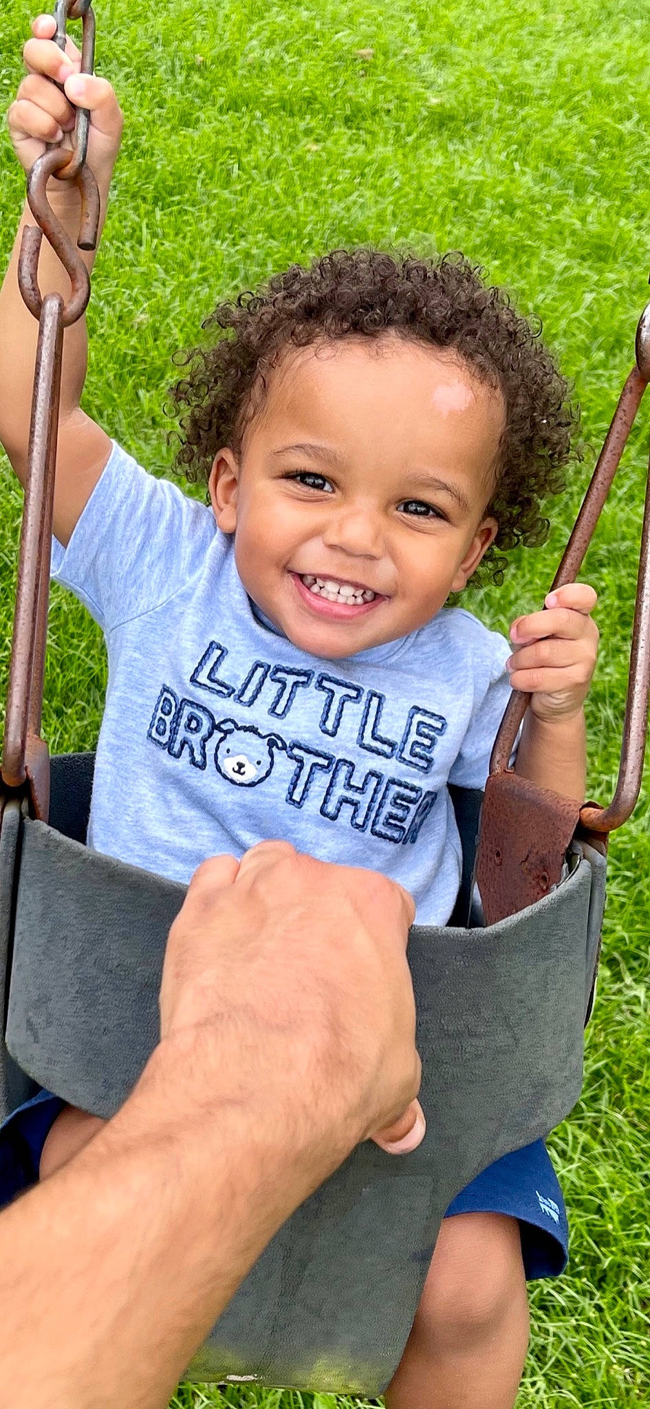 Dominick joined the competition — help win amazing prizes! arm, blue, eye, facial_expression, finger, fun, gesture, grass, hairstyle, hand, happy, human_body, joy, leisure, people_in_nature, person, product, skin, sleeve, smile