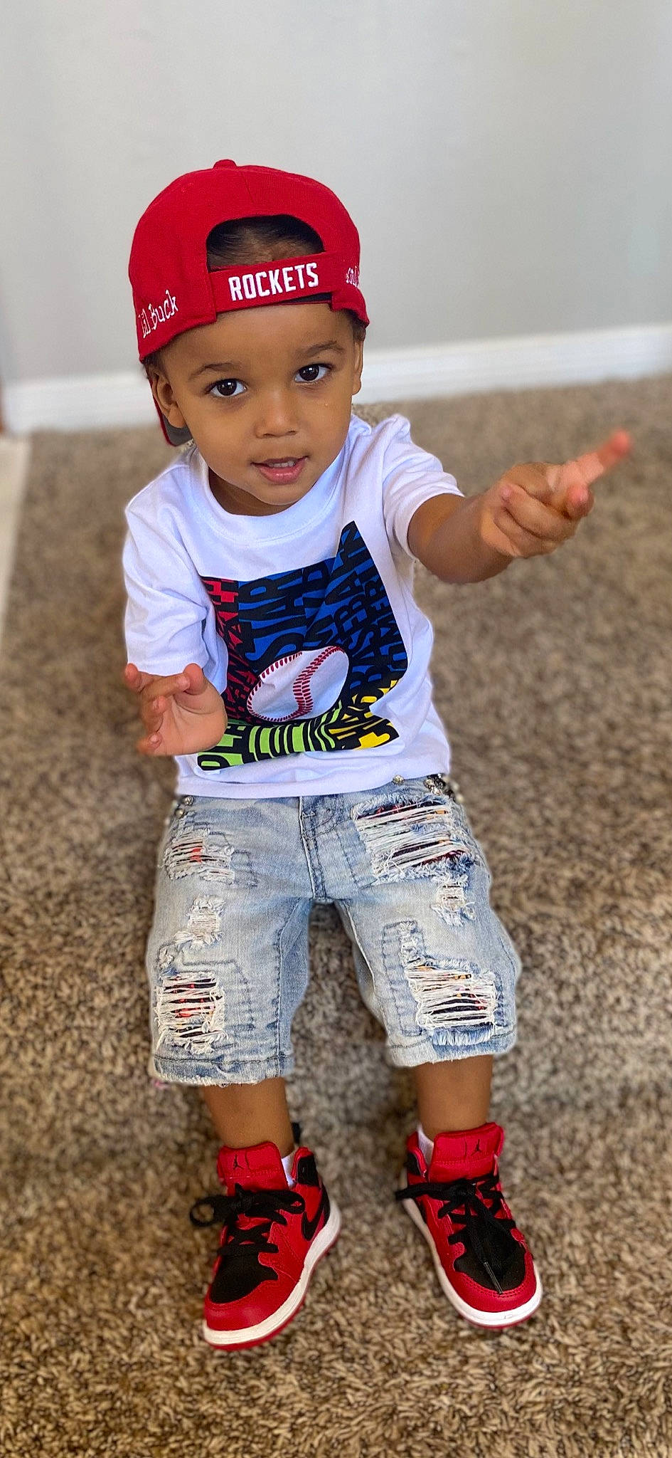 Dominick joined the competition — help win amazing prizes! active_shorts, baseball_cap, cap, child, cool, face, facial_expression, hairstyle, happy, head, headwear, human_body, person, recreation, red, shorts, sleeve, sportswear, t_shirt, toddler