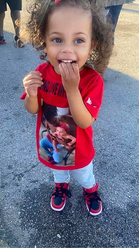 Decklynn joined the competition — help win amazing prizes! baby_toddler_clothing, clothing, cool, eye, face, facial_expression, finger, fun, gesture, happy, joy, mammal, mouth, person, photograph, red, skin, sleeve, smile, standing