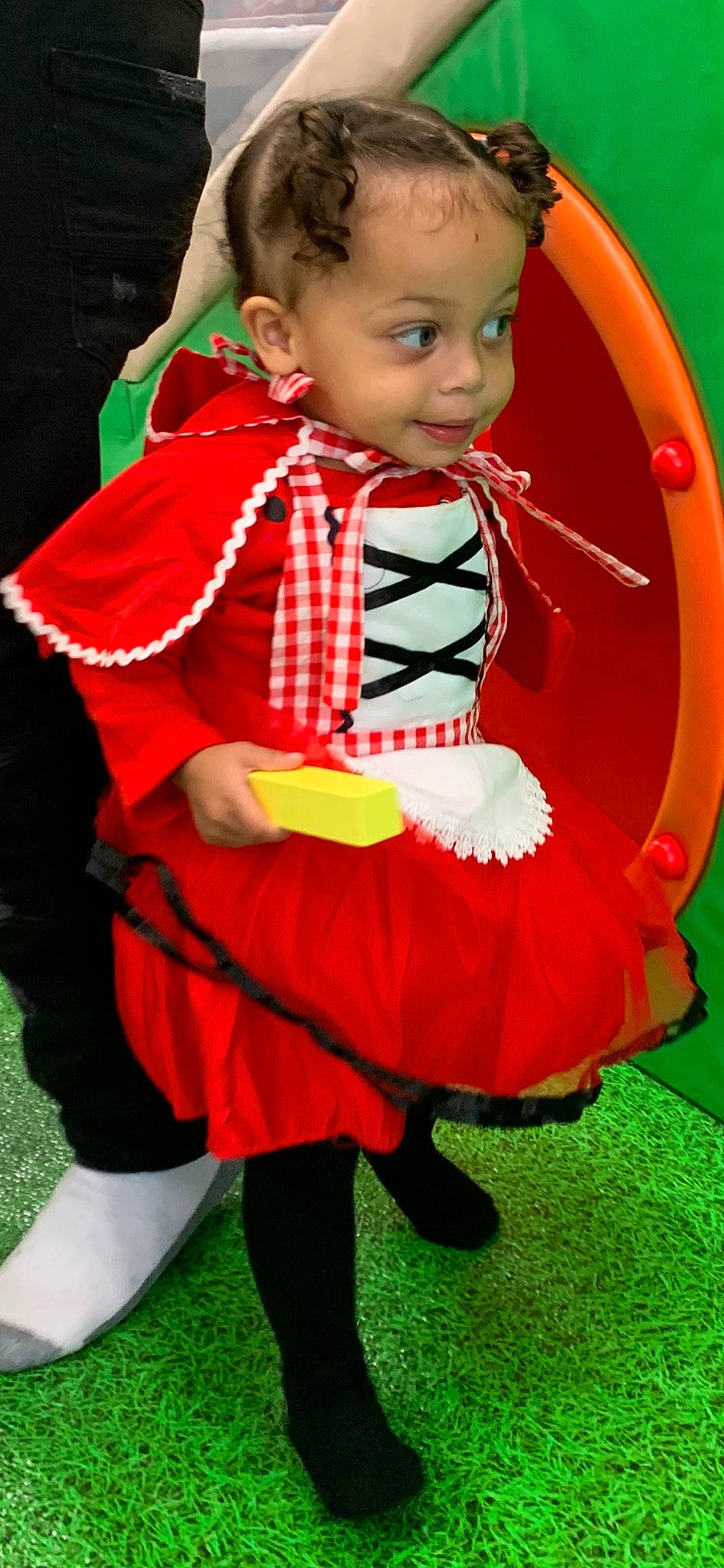 Decklynn is registered to the contest to win money with this photo: baby, baby_products, baby_toddler_clothing, child, child_model, costume, costume_accessory, event, fun, grass, green, happy, pattern, person, personal_protective_equipment, red, sitting, sleeve, toddler