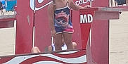 Raylynn joined the competition — help win amazing prizes! child, beach, lifeguard_chair, red, coca_cola, ocean_city_md, summer, sand, braids, outdoor, advertisement, people, vacation, sunny, clothing, portrait, standing, tourists, boardwalk, fun