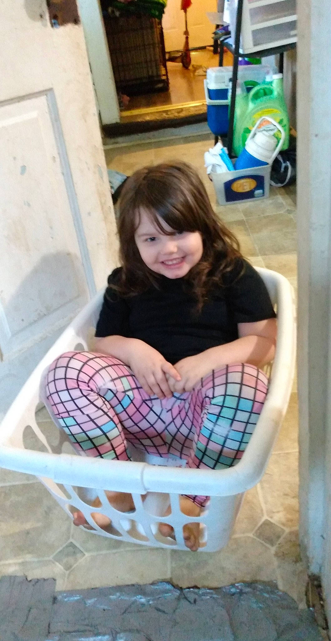 Kelly is registered to the contest to win money with this photo: blond, chair, comfort, dress, flooring, fun, happy, human_body, human_leg, joy, knee, leisure, long_hair, pattern, person, plaid, sitting, smile, tartan, textile