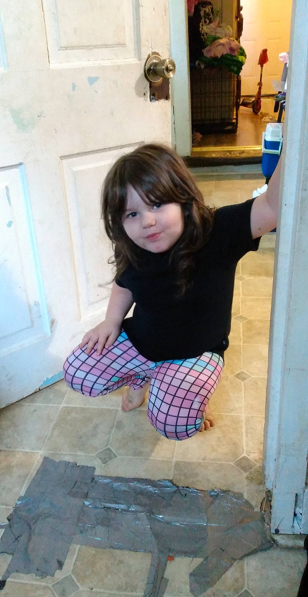 Kelly joined the competition — help win amazing prizes! arm, bangs, blue, door, finger, fun, hairstyle, hand, happy, joint, knee, person, plaid, purple, smile, standing, tartan, thigh, toddler, waist