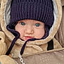 Alméo a rejoint le concours — aidez-le/la à gagner de superbes lots ! baby, infant, face, hat, knit_hat, blue_eyes, jacket, fuzzy, plush_toy, pacifier, chain, clothing, closeup, portrait, cute, child, warm, cozy, baby_carrier, smile