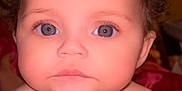 Iris joined the competition — help win amazing prizes! baby, child, face, blue_eyes, curly_hair, portrait, close_up, skin, cute, infant, looking, expressionless, indoors, person, young_child, head_and_shoulders, soft_light, blurred_background, naked_shoulders, human