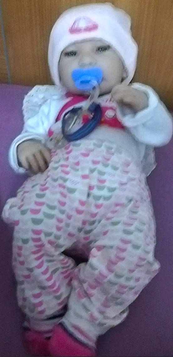 Lola participe au concours pour gagner de l'argent avec cette photo : baby_products, baby_toddler_clothing, baby_toys, child, costume, doll, fur, headwear, linens, magenta, pattern, person, pink, plush, room, sleeve, stuffed_toy, teddy_bear, textile, toy