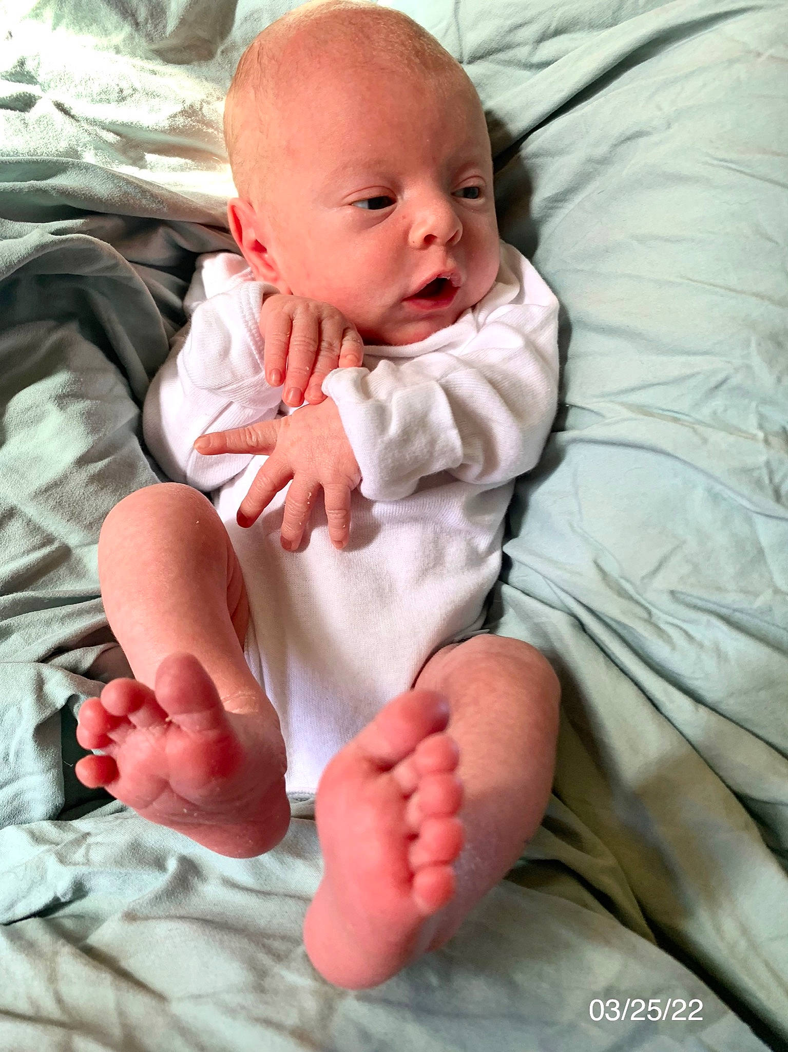 Zayne joined the competition — help win amazing prizes! arm, baby, baby_toddler_clothing, barefoot, cheek, comfort, face, finger, foot, gesture, hand, happy, leg, linens, nail, person, skin, sleeve, stomach, thumb