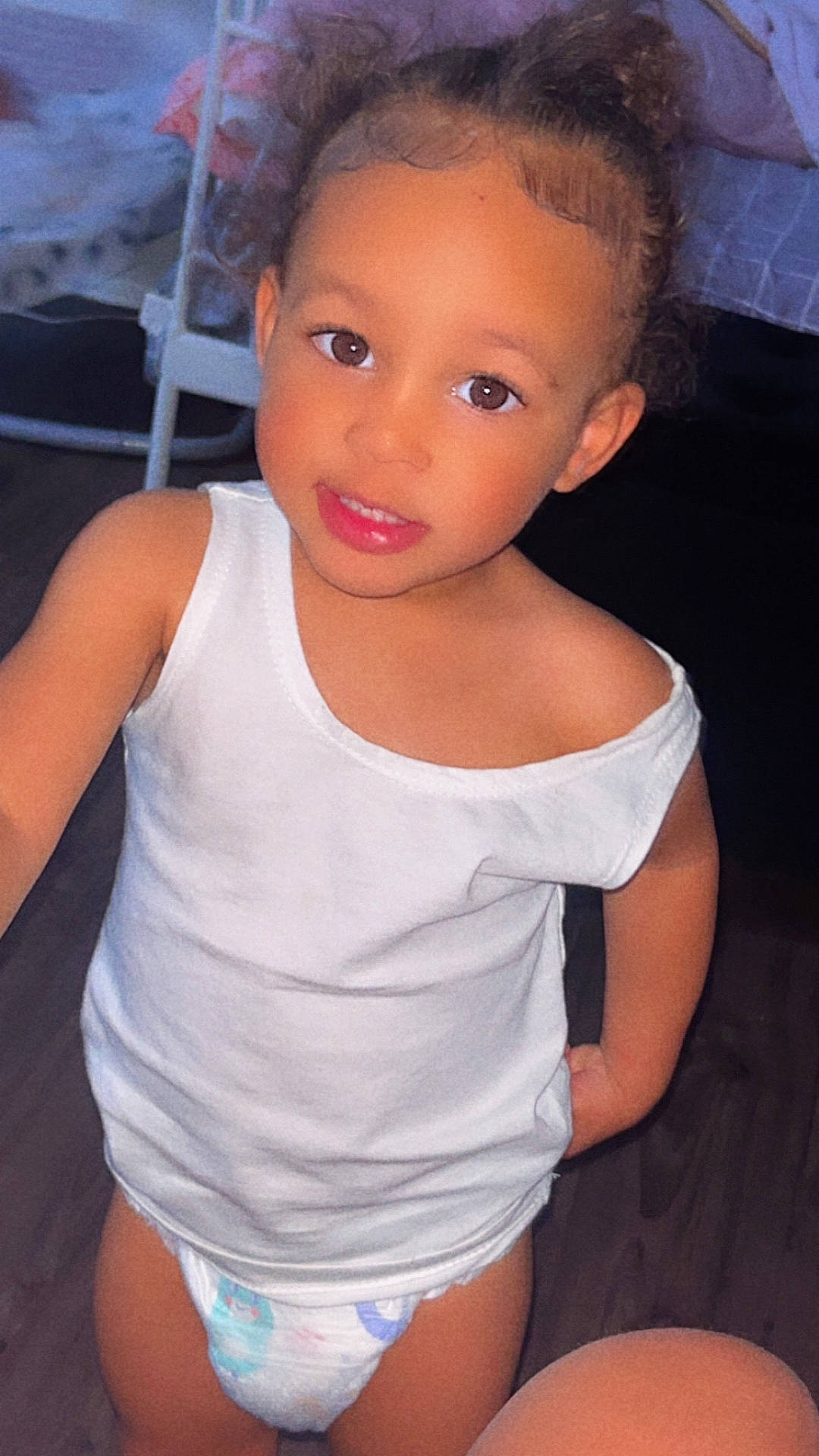 Leilani is registered to the contest to win money with this photo: child, clothing, diaper, face, female, girl, happy, head, lingerie, person, photography, portrait, shorts, sitting, smile, swimwear, t_shirt, tanktop, undershirt, underwear