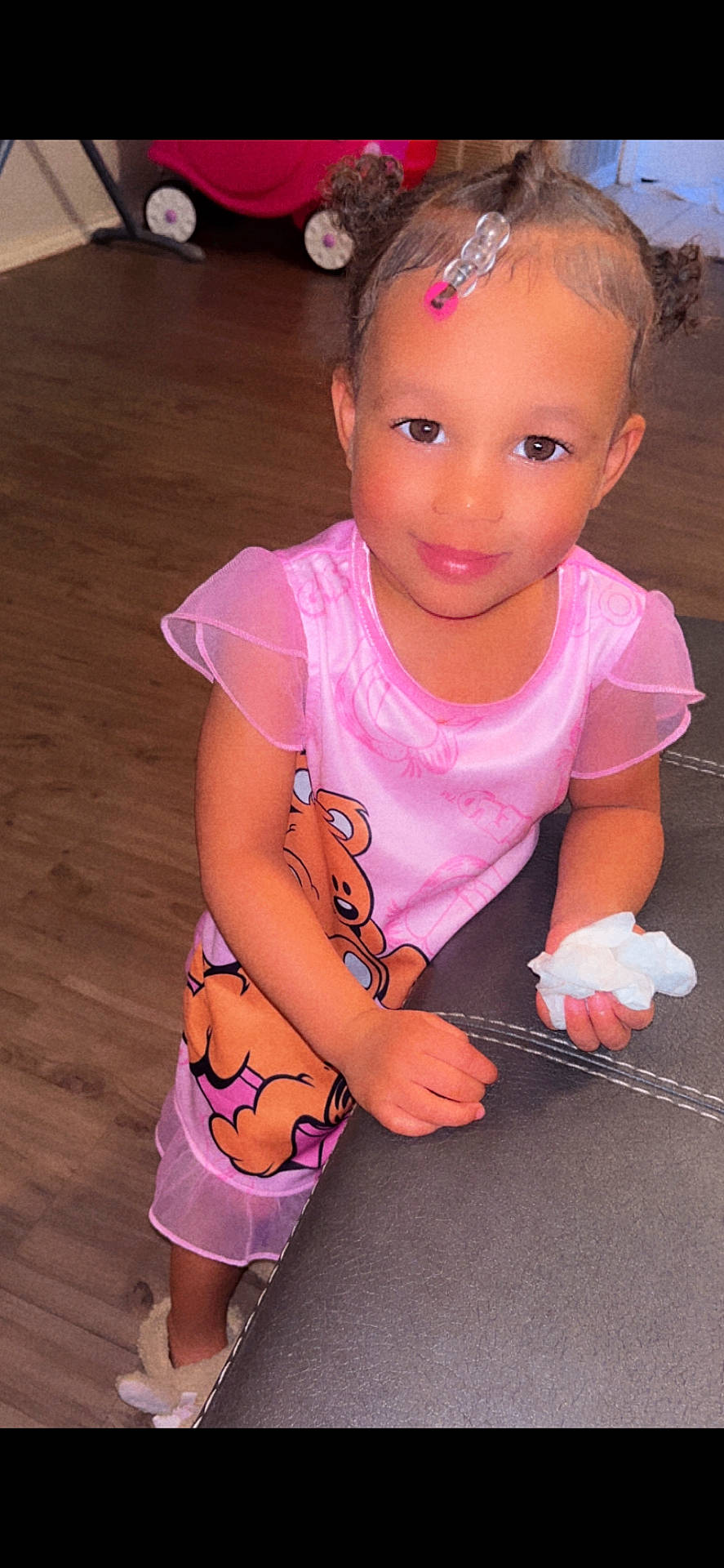 Leilani joined the competition — help win amazing prizes! bodypart, child, clothing, couch, dress, face, female, finger, furniture, girl, hand, hardwood, head, machine, person, photography, portrait, skin, tattoo, wood