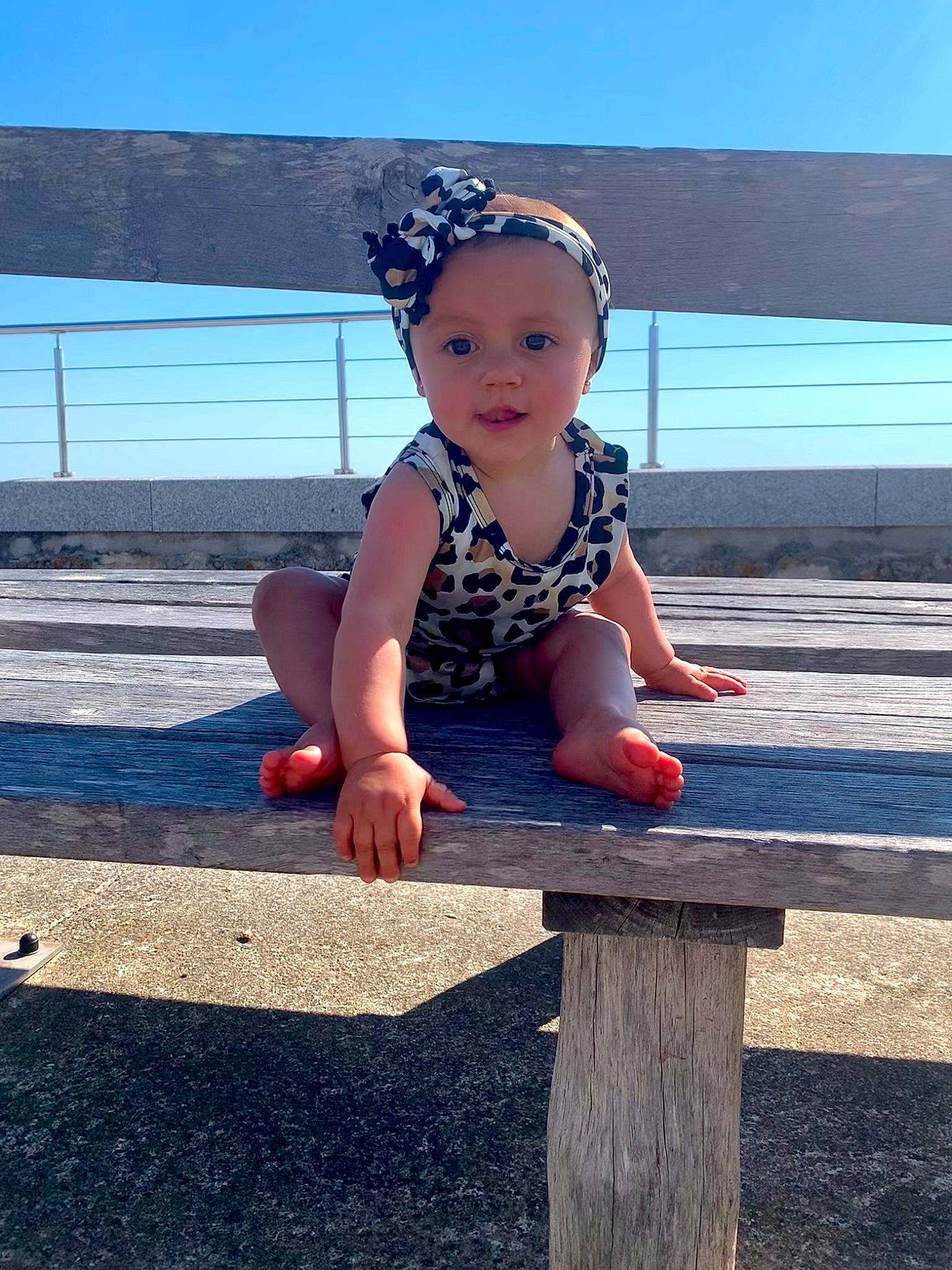 Molly participe au concours pour gagner de l'argent avec cette photo : azure, baby_toddler_clothing, child, electric_blue, eye, foot, fun, happy, hat, headwear, human_body, human_leg, leg, leisure, people_in_nature, person, recreation, sky, standing, summer