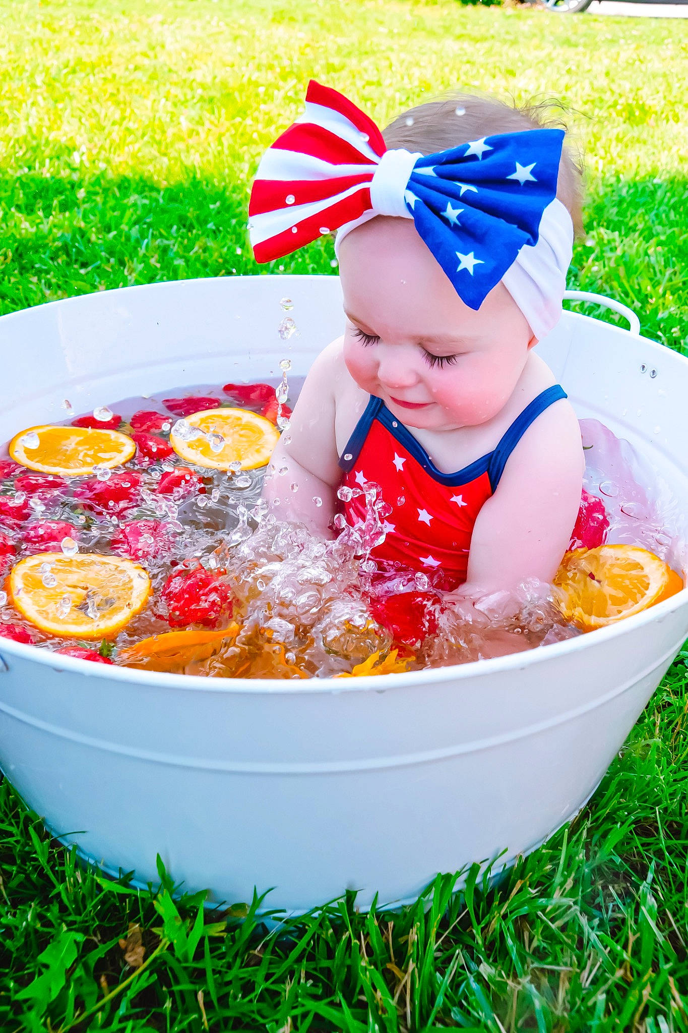 Koda joined the competition — help win amazing prizes! baby, baby_products, baby_toddler_clothing, bathing, child, event, fun, grass, happy, hat, leisure, person, personal_protective_equipment, plant, play, recreation, toddler, water, yellow