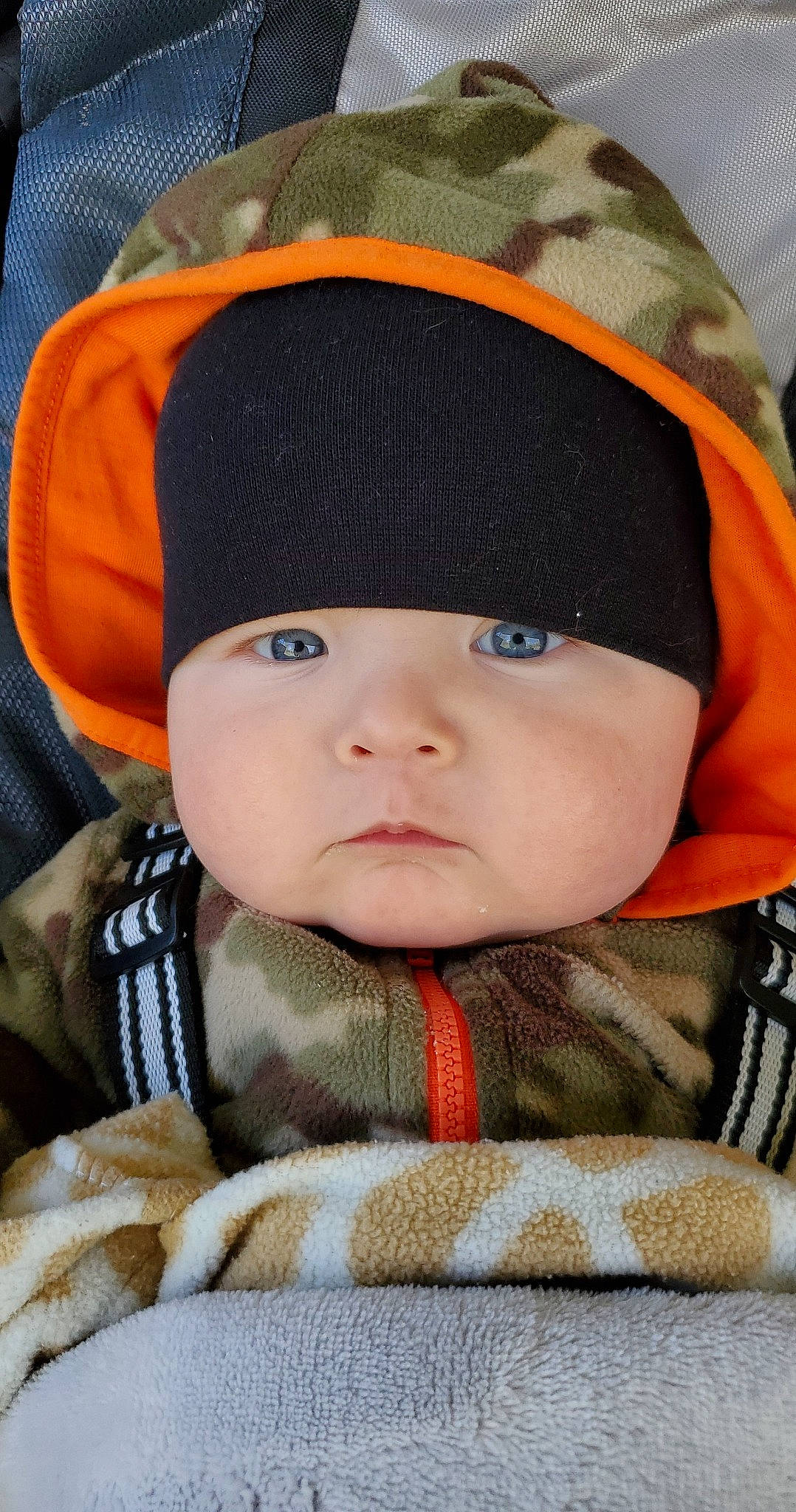 Brycen joined the competition — help win amazing prizes! baby, baby_toddler_clothing, beanie, cap, cheek, child, collar, comfort, electric_blue, fashion_accessory, headgear, headwear, knit_cap, linens, outerwear, pattern, person, sitting, skin, sleeve