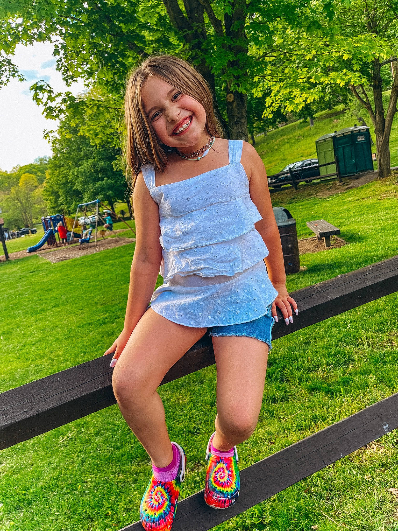 Haylie joined the competition — help win amazing prizes! electric_blue, face, fun, grass, happy, human_leg, joy, knee, leisure, people_in_nature, person, pink, plant, recreation, shorts, smile, street_fashion, summer, t_shirt, thigh