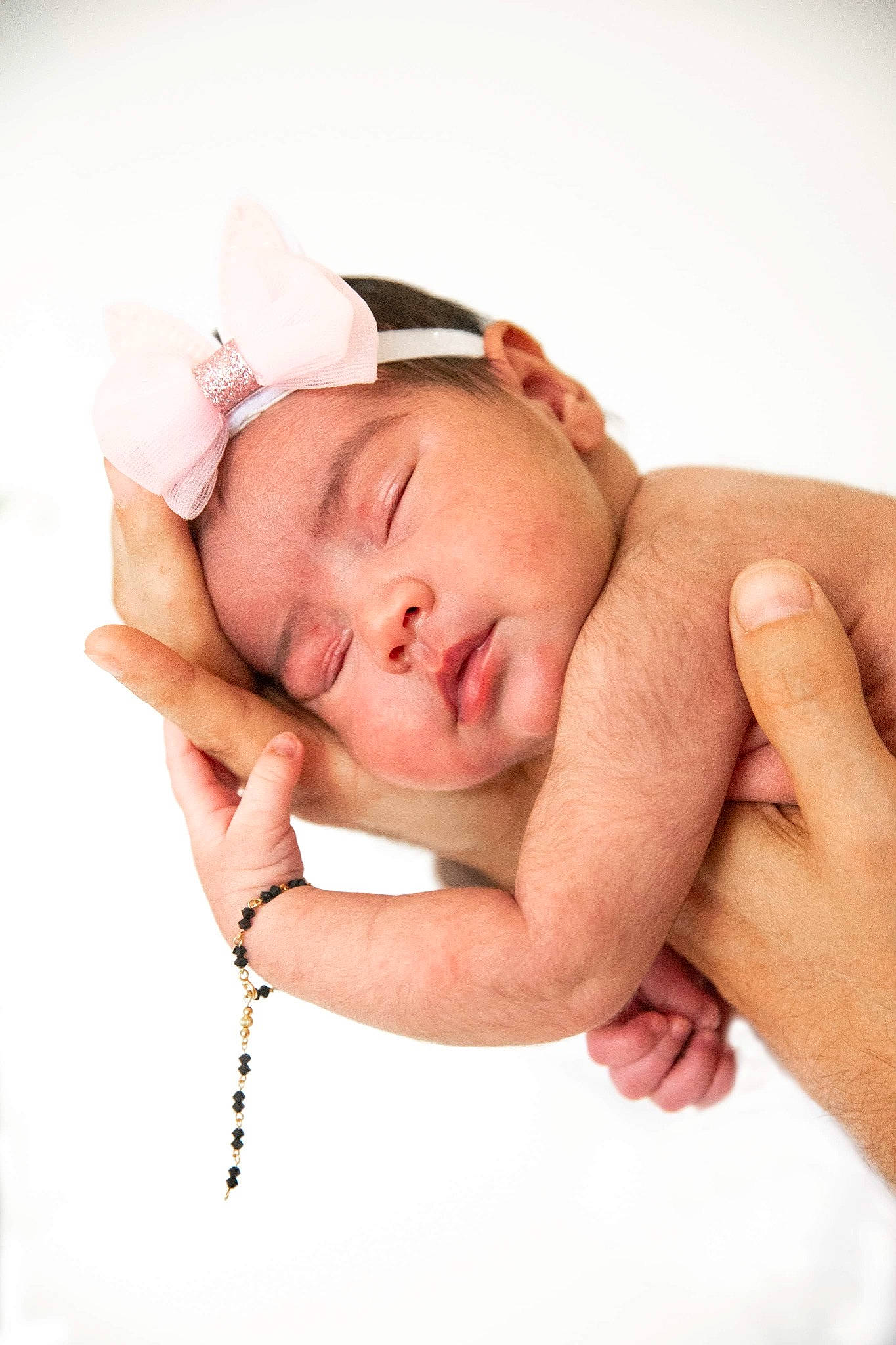 Madelyn is registered to the contest to win money with this photo: arm, baby, baby_sleeping, baby_toddler_clothing, cheek, child, comfort, eyebrow, eyelash, finger, gesture, hand, happy, headwear, linens, mouth, neck, person, skin, sleeve