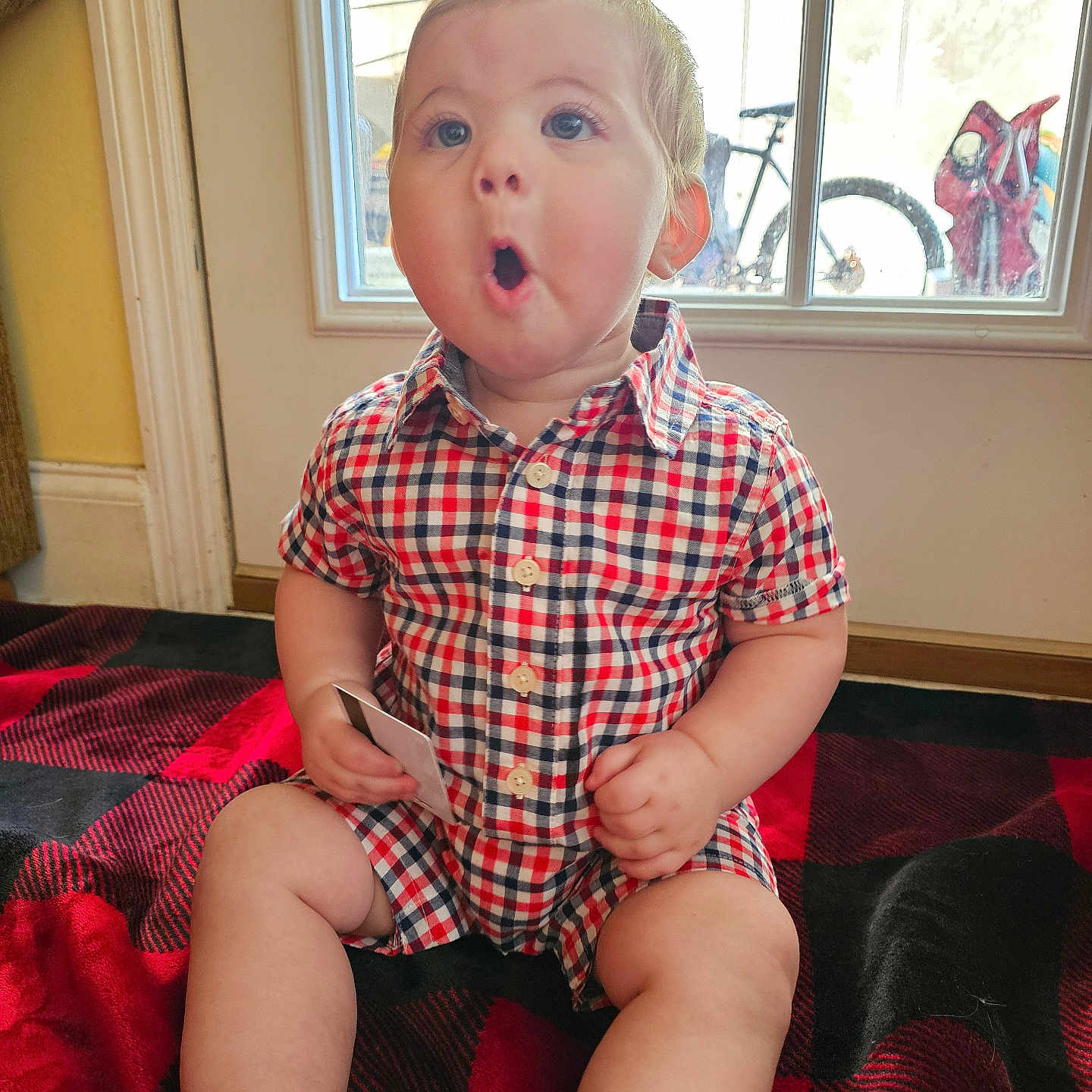 Jameson joined the competition — help win amazing prizes! baby, bicycle, bodypart, clothing, couch, face, finger, furniture, hand, head, indoors, person, photography, portrait, shirt, shorts, sitting, t_shirt, transportation, vehicle