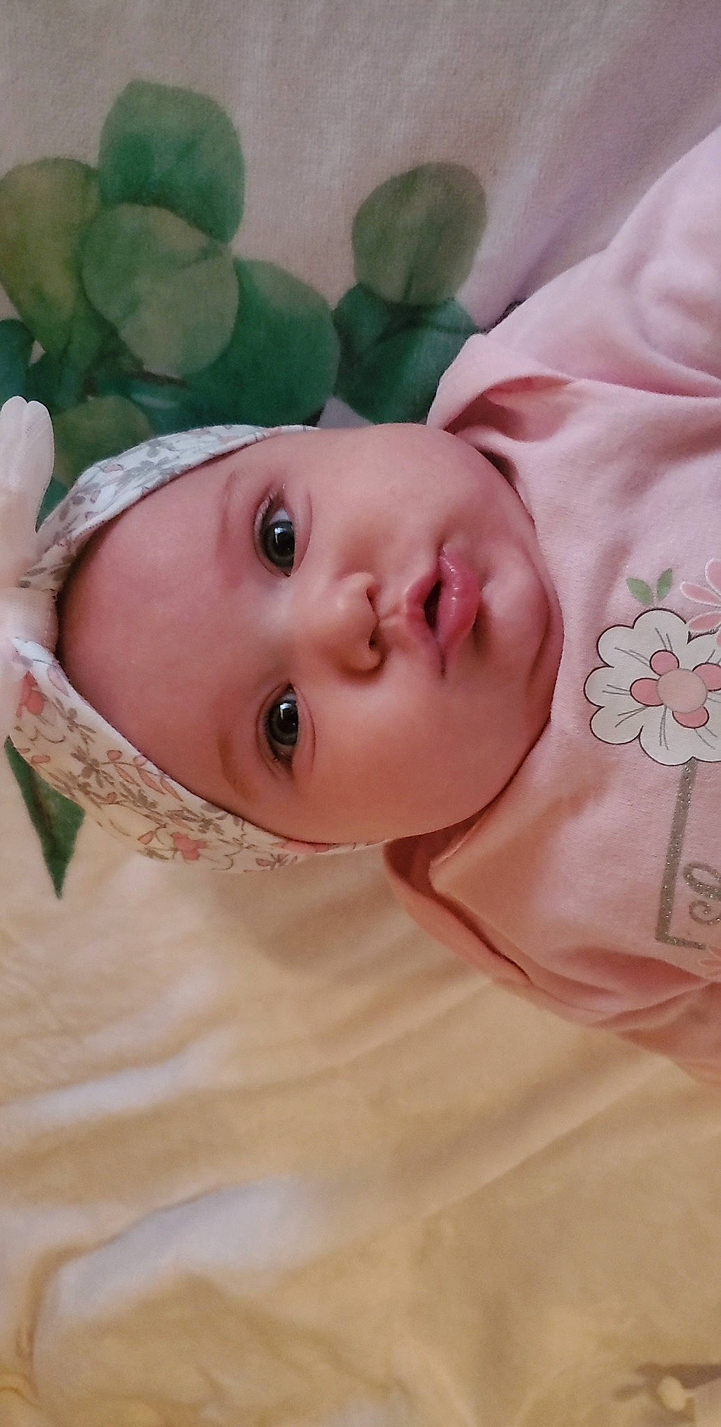 Lilac is registered to the contest to win money with this photo: baby, baby_toddler_clothing, cheek, dress, eye, eyebrow, eyelash, grass, hair, happy, headgear, headwear, iris, lip, neck, nose, person, pink, plant, skin