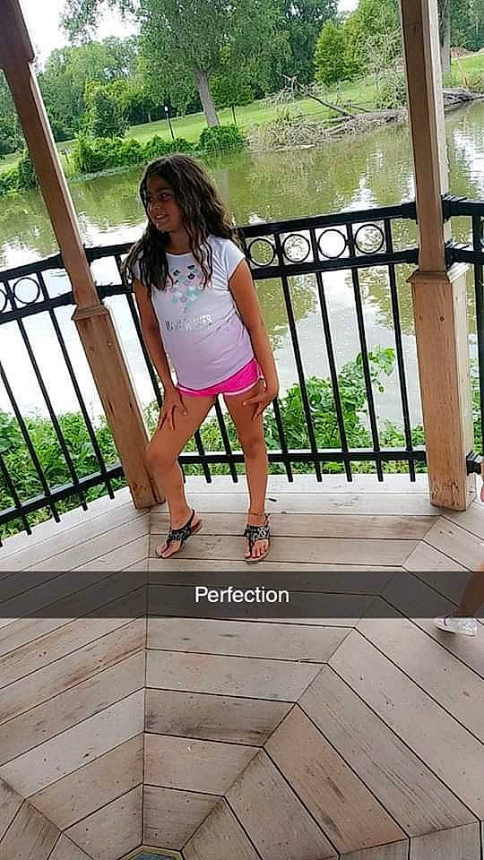 Chloe is registered to the contest to win money with this photo: dress, fawn, footwear, handrail, human_leg, joy, leg, leisure, long_hair, person, pink, shoe, stairs, swing, thigh, waist