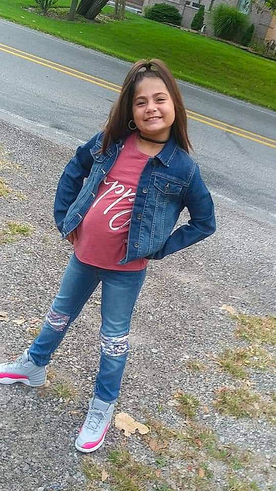 Chloe is registered to the contest to win money with this photo: blazer, child_model, clothing, denim, electric_blue, footwear, jacket, jeans, joy, leggings, outerwear, person, pink, shoe, smile, style, textile, top, trousers