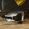 Bruce joined the competition — help win amazing prizes! black_cat, cat, bag, floor, wooden_floor, couch, yellow_bag, indoor, pet, feline, animal, cozy, household, resting, domestic_cat, fur, sitting, home, furniture, pause_icon