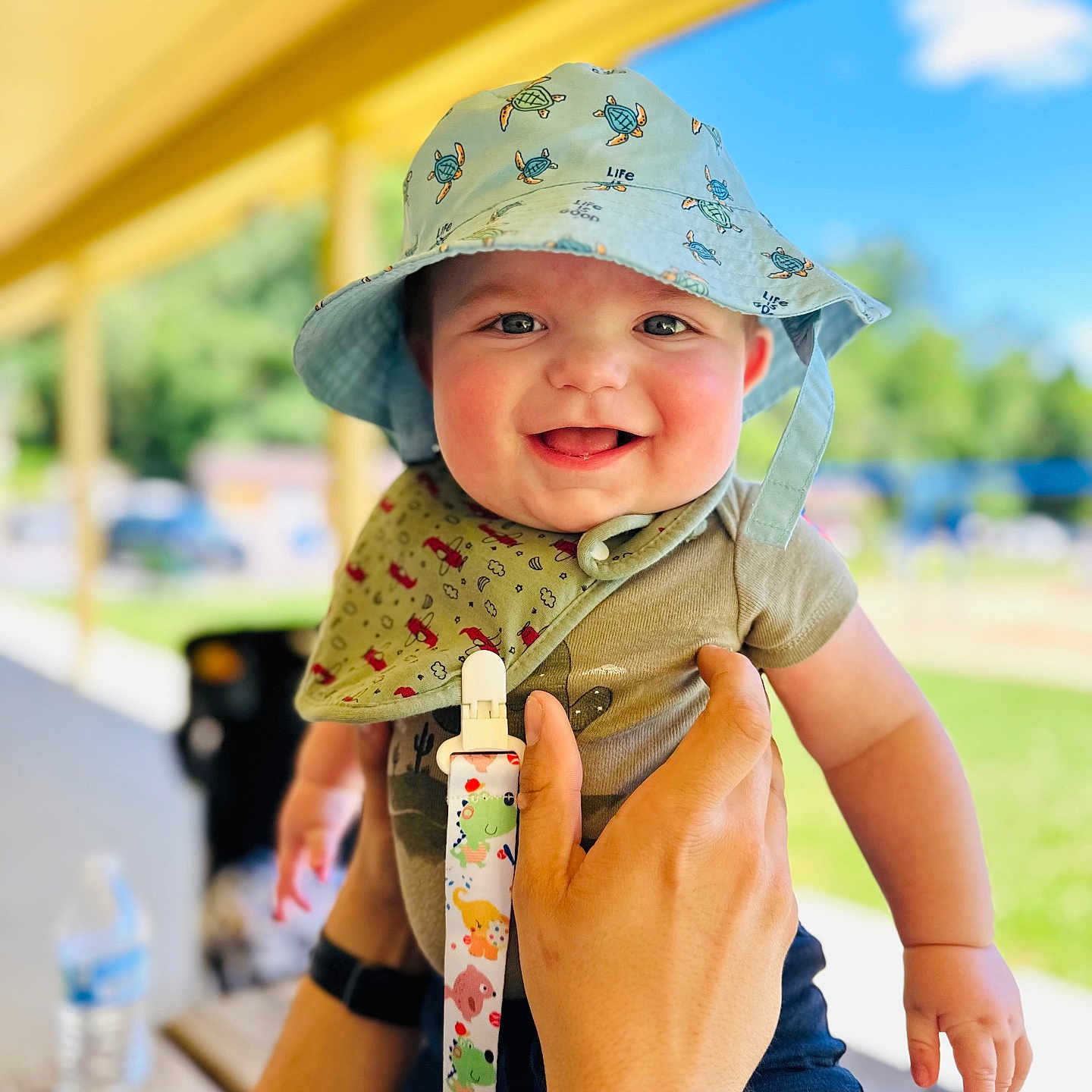 Brantley is registered to the contest to win money with this photo: baby, bodypart, cap, clothing, cream, dessert, face, finger, food, hand, happy, hat, head, icecream, person, photography, portrait, sitting, smile, sunhat