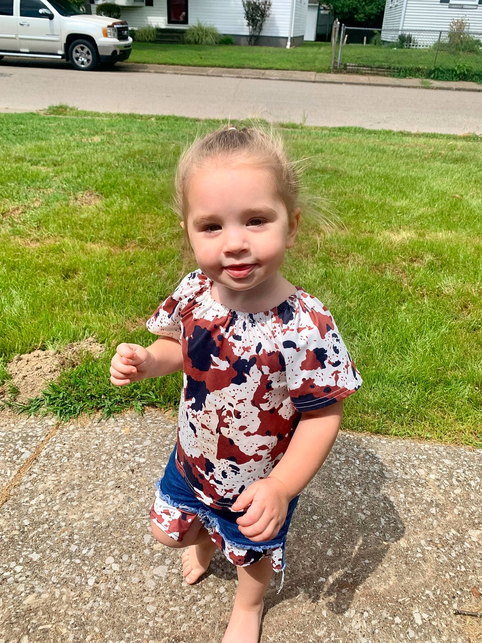 Addilynn is registered to the contest to win money with this photo: asphalt, baby_toddler_clothing, child, dress, fun, grass, hairstyle, happy, joy, leg, mammal, people, people_in_nature, person, plant, sleeve, standing, summer, tire, toddler
