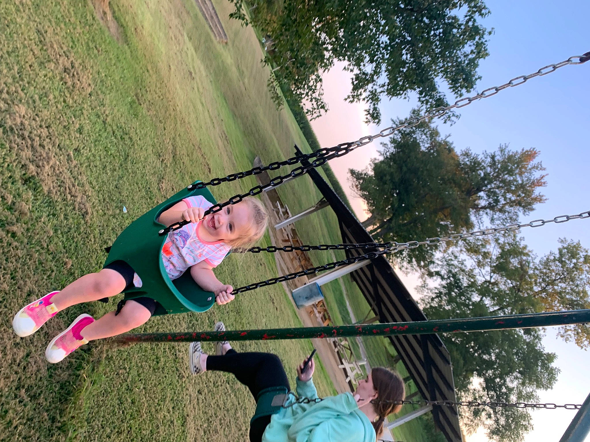 Addilynn joined the competition — help win amazing prizes! adventure, fun, grass, happy, knee, landscape, leisure, outdoor_play_equipment, people_in_nature, person, plant, pole, recreation, rope, shorts, sky, smile, sneakers, thigh, tree