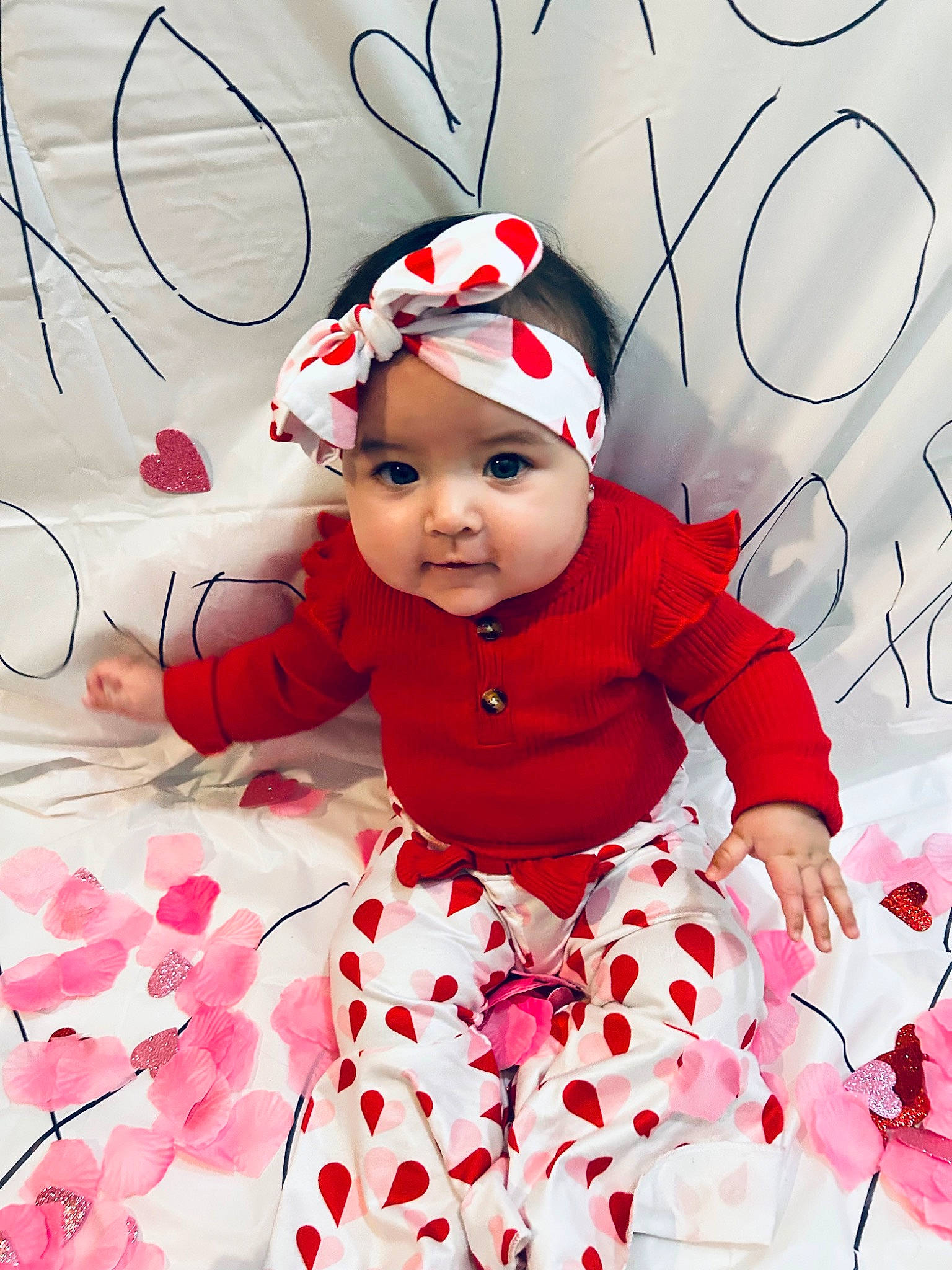 Ivy joined the competition — help win amazing prizes! baby, baby_toddler_clothing, cap, child, costume_hat, event, facial_expression, fun, happy, headwear, holiday, magenta, pattern, person, petal, pink, red, sleeve, smile, toddler