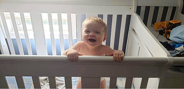 Carsen is registered to the contest to win money with this photo: baby, baby_products, baby_safety, bed, child, furniture, infant_bed, person, product, skin, smile, toddler