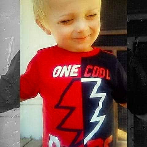 Brantly is registered to the contest to win money with this photo: baby, cheek, child, cool, face, fictional_character, head, jersey, joy, male, outerwear, person, product, red, shirt, sleeve, smile, sports_uniform, sportswear, t_shirt