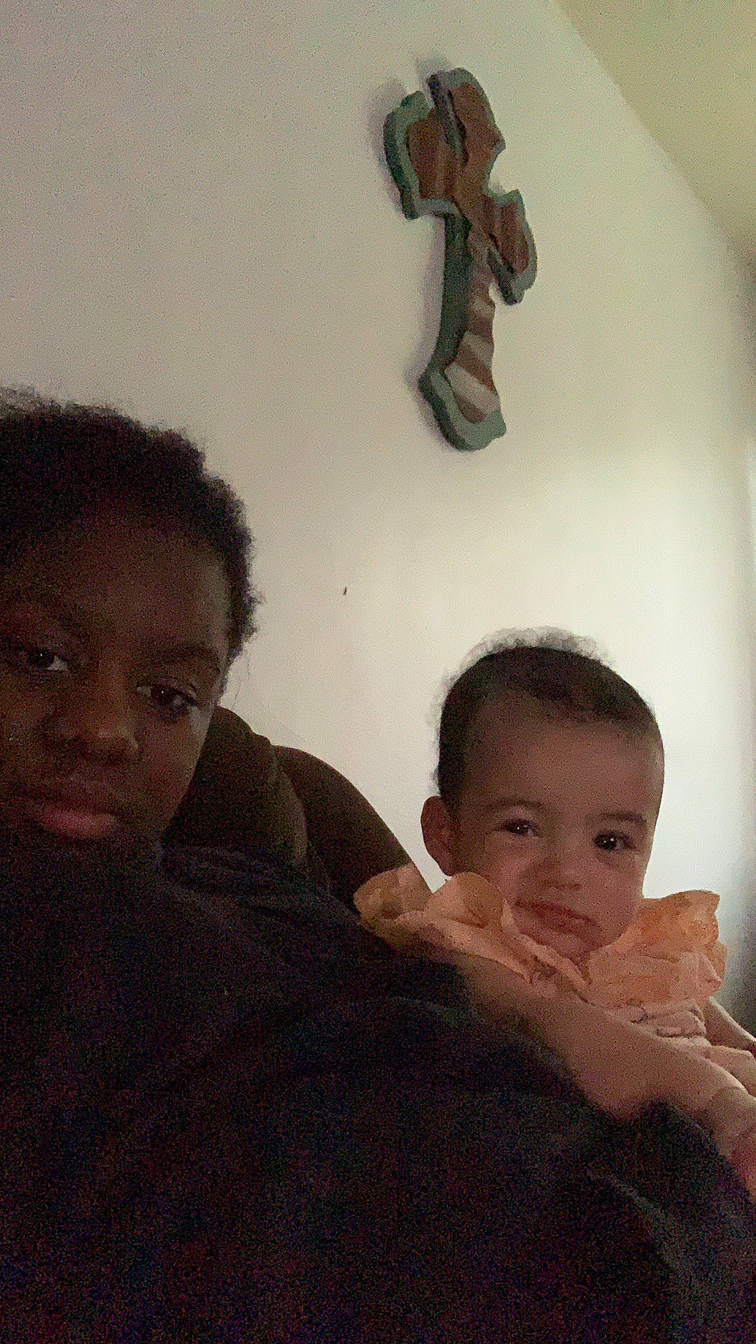 Gionna is registered to the contest to win money with this photo: artifact, baby, baby_toddler_clothing, cheek, child, comfort, eye, finger, forehead, gesture, hairstyle, happy, iris, mammal, nose, organ, person, room, skin, standing