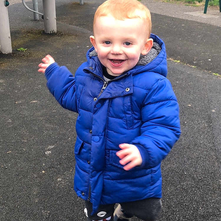 Jenson Aidan Wheeler is registered to the contest to win money with this photo: baby, blue, child, electric_blue, face, jacket, jeans, joy, outerwear, people, person, plant, play, skin, smile, standing, toddler