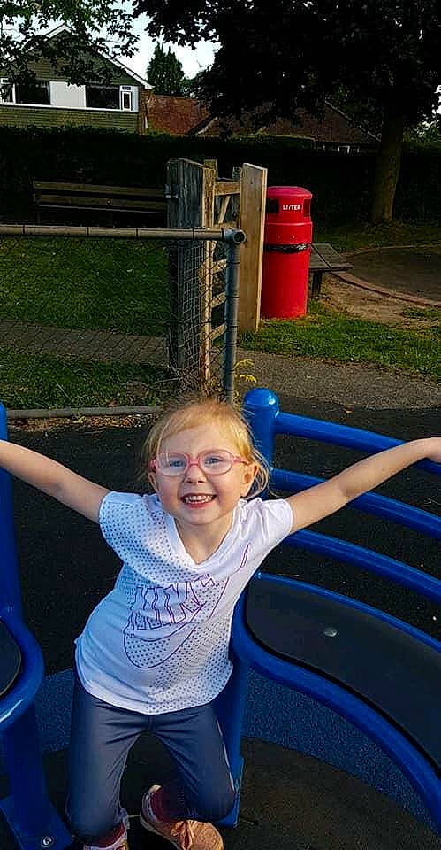 Demi-leigh is registered to the contest to win money with this photo: child, city, fun, joy, leisure, outdoor_play_equipment, person, play, playground, public_space, recreation, smile, toddler, trampolining_equipment_and_supplies