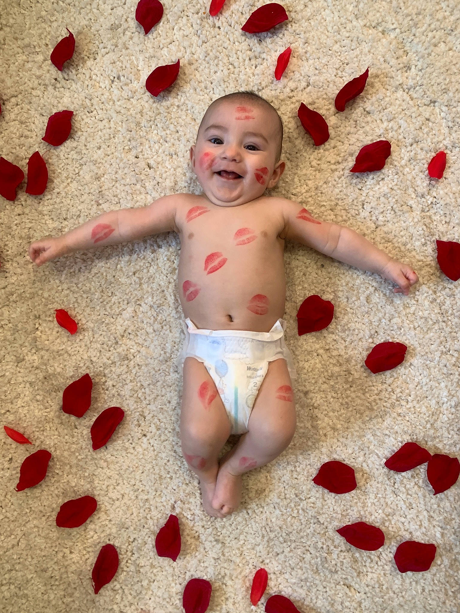 Maximiliano joined the competition — help win amazing prizes! abdomen, baby, barefoot, child, finger, flesh, leg, pattern, person, petal, photography, pink, red, skin, stomach, toddler