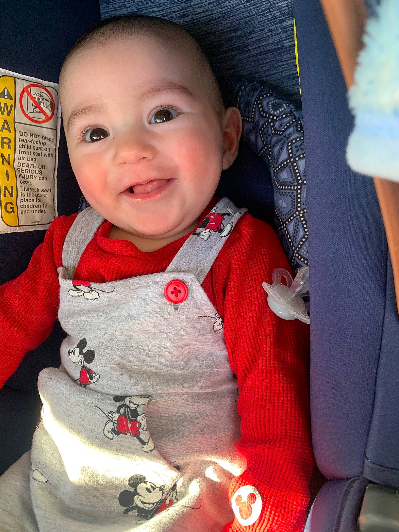 Maximiliano is registered to the contest to win money with this photo: baby, car_seat, cheek, child, joy, outerwear, person, sitting, skin, smile, toddler