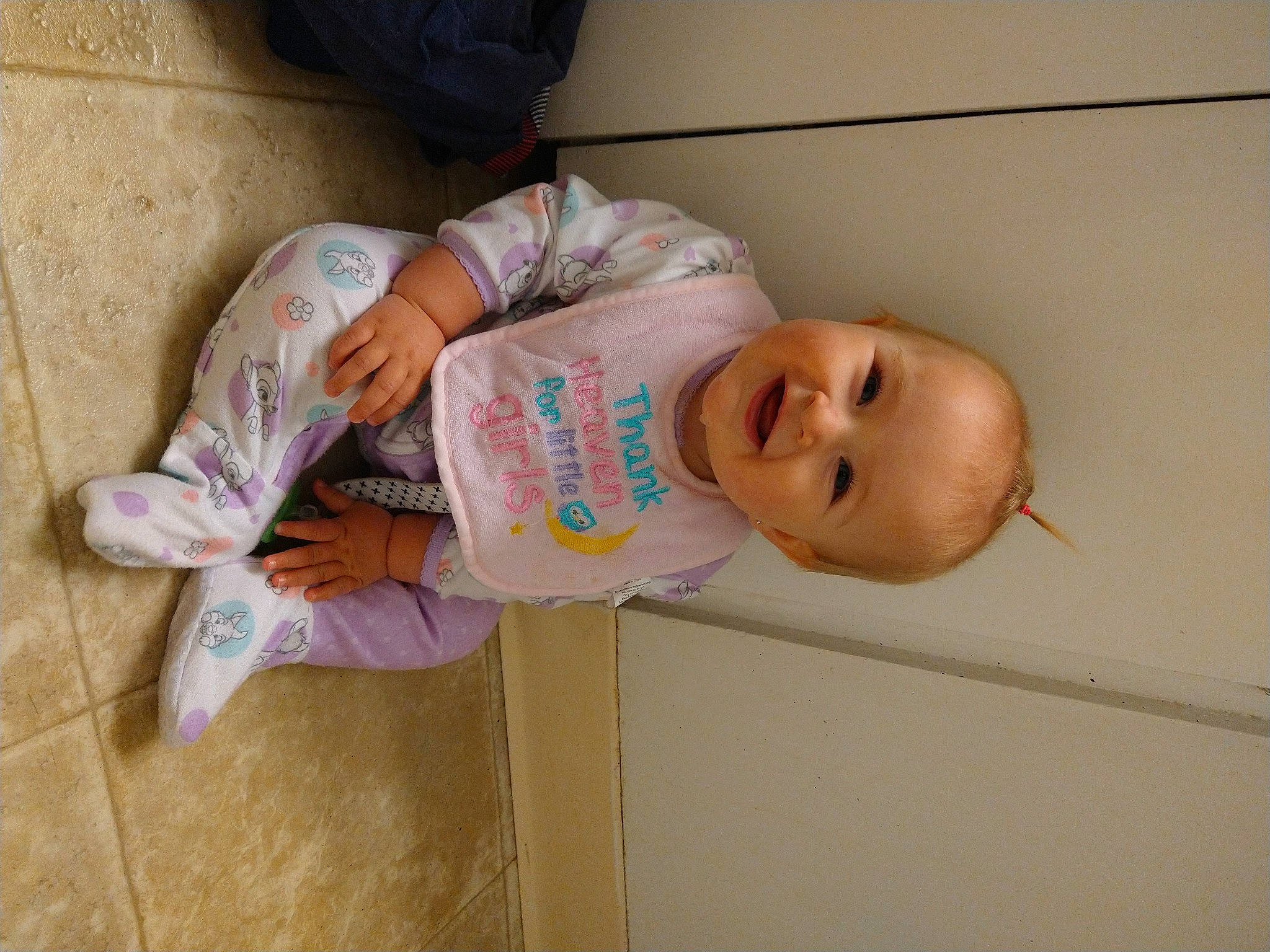 Sariah is registered to the contest to win money with this photo: baby, baby_laughing, baby_products, baby_toddler_clothing, cheek, child, clothing, comfort, flooring, hand, happy, hardwood, joy, person, room, skin, sleeve, smile, toddler, wood