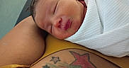 Phantaisa joined the competition — help win amazing prizes! newborn, baby, sleeping, blanket, tattoo, arm, skin, closeup, resting, peaceful, infant, person, human, young, cute, portrait, wrapped, soft, calm, indoors