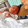 Phantaisa joined the competition — help win amazing prizes! newborn, baby, adult, hospital, blanket, face, skin, person, closeup, love, care, tenderness, holding, sleeping, indoors, fabric, comfort, portrait, gentle, family