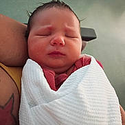 Phantaisa joined the competition — help win amazing prizes! newborn, baby, infant, wrapped, blanket, arm, tattoo, sleeping, peaceful, portrait, closeup, skin, face, person, indoors, soft_light, resting, human, cute, child