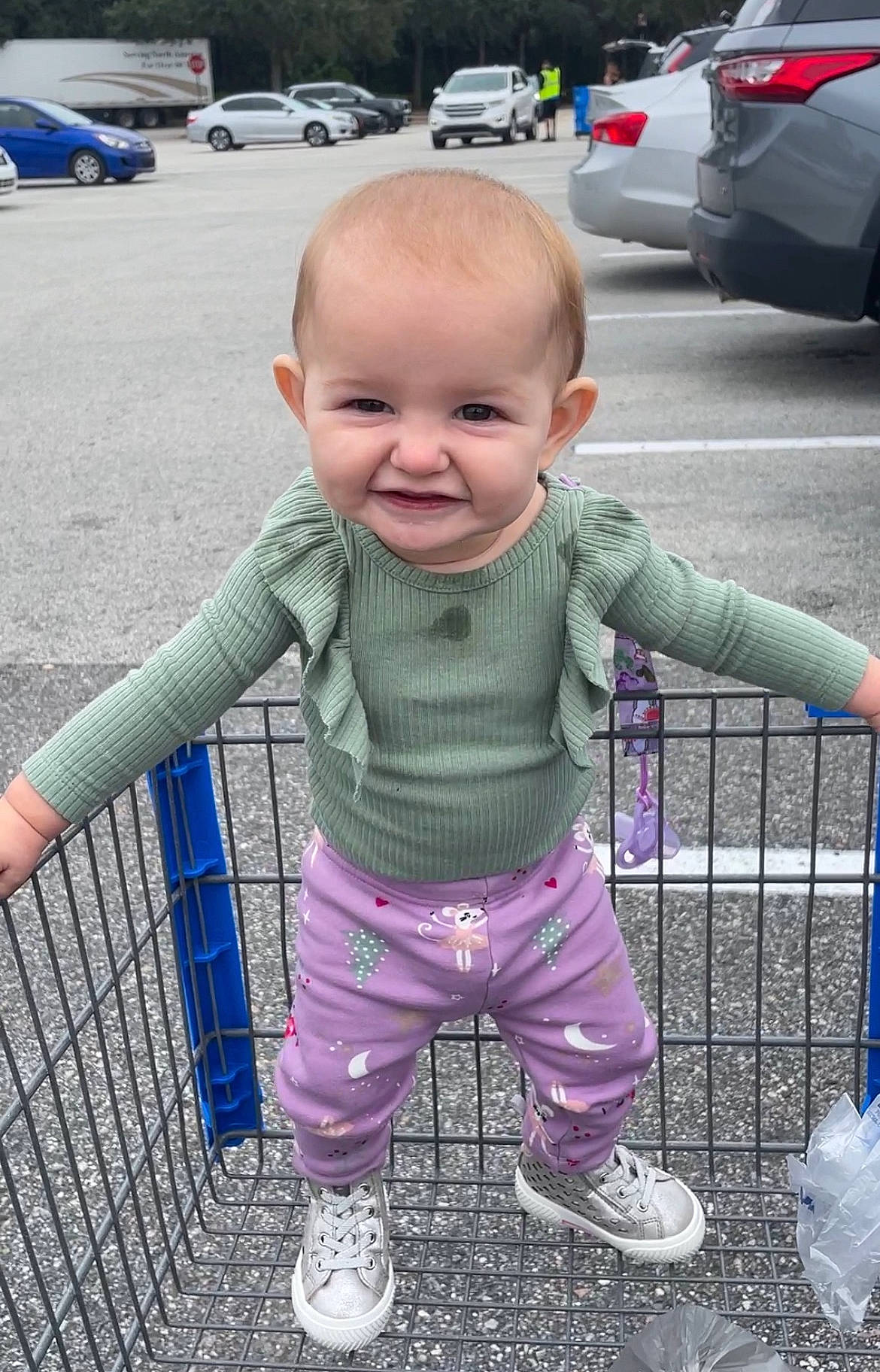 Gillian is registered to the contest to win money with this photo: baby, baby_toddler_clothing, car, cool, facial_expression, fun, grass, happy, joy, outerwear, person, photograph, pink, product, skin, sleeve, smile, snapshot, tire, toddler