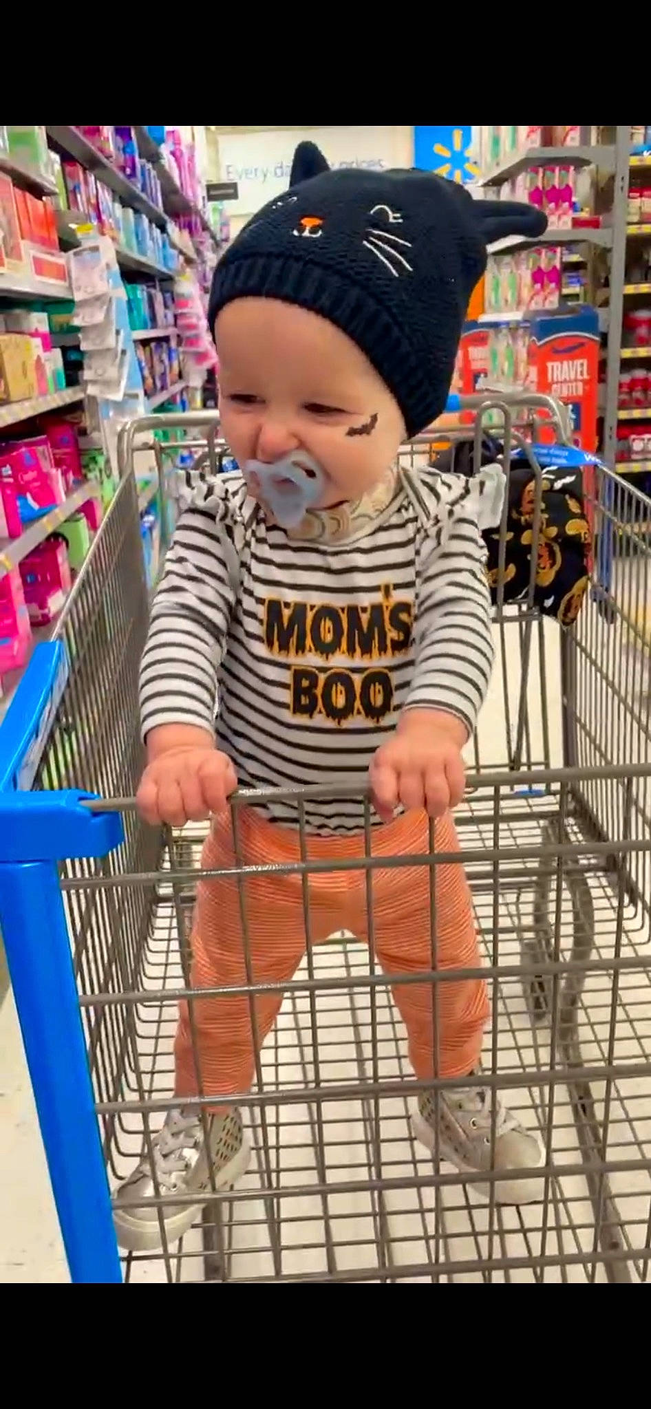 Gillian joined the competition — help win amazing prizes! baby, baby_safety, baby_toddler_clothing, blue, cap, child, customer, fun, hat, headwear, organ, people, person, photograph, retail, shelf, shopping, shopping_cart, sleeve, smile