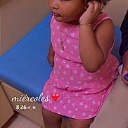 Charlotte joined the competition — help win amazing prizes! child, girl, pink_dress, sneakers, curly_hair, bow, blue_bench, indoor, tile_floor, jewelry, bracelet, necklace, sitting, thoughtful, portrait, casual_clothing, person, young_child, happy, cute