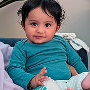 Veer joined the competition — help win amazing prizes! baby, blanket, bracelet, child, clothing, couch, cozy, curly_hair, eyes, face, foot, hand, indoor, infant, person, portrait, smile, teal_shirt, toes, white_pants