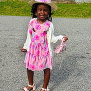 Wynter joined the competition — help win amazing prizes! accessories, child, earrings, fashion, floral_pattern, girl, grass, happy, necklace, outdoor, paved_surface, pink_dress, pink_purse, posing, sandals, smiling, straw_hat, summer, white_cardigan, wooden_fence