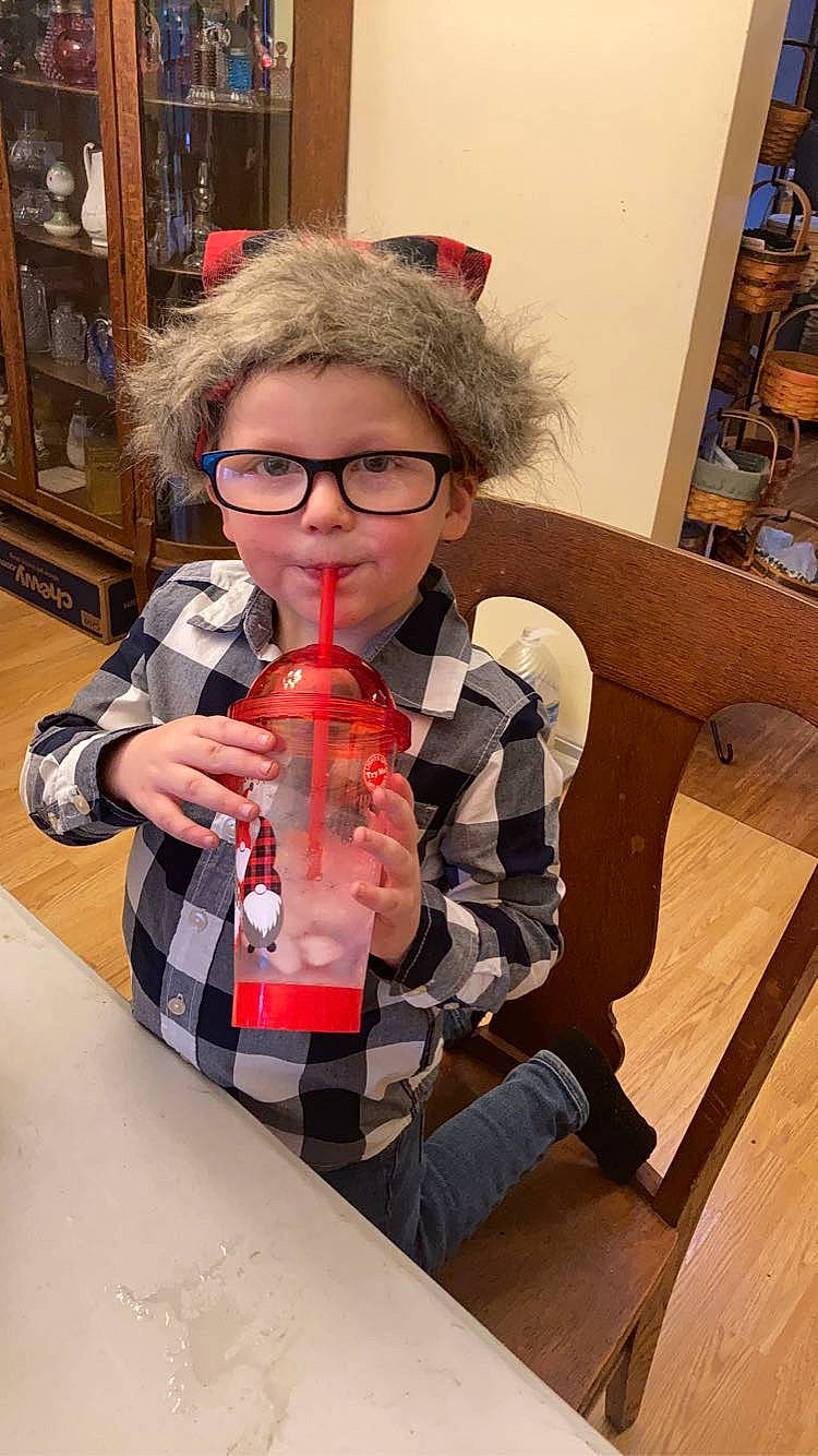 Bentley joined the competition — help win amazing prizes! cap, carmine, child, costume, eyewear, fashion_accessory, flooring, fun, fur, glasses, goggles, holiday, pattern, person, personal_protective_equipment, plaid, sunglasses, tartan, toy, vision_care