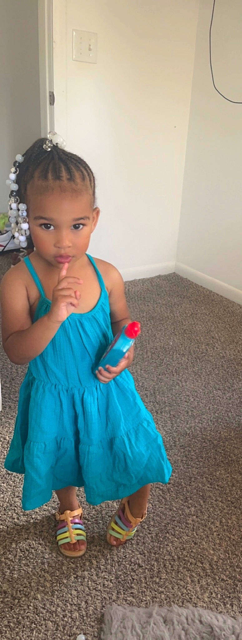 Cailey is registered to the contest to win money with this photo: baby_toddler_clothing, day_dress, dress, electric_blue, formal_wear, gesture, hairstyle, happy, human_leg, jewellery, joint, long_hair, nail, neck, one_piece_garment, person, shoulder, skin, thumb, toddler