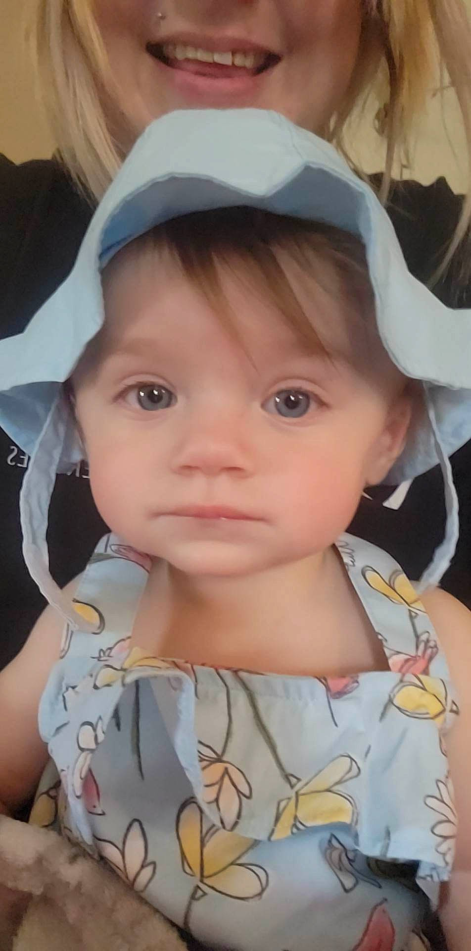 Lillianna is registered to the contest to win money with this photo: cap, cheek, chin, cool, eye, eyebrow, eyelash, facial_expression, forehead, hair, head, headgear, iris, lip, neck, nose, person, skin, sleeve, toddler