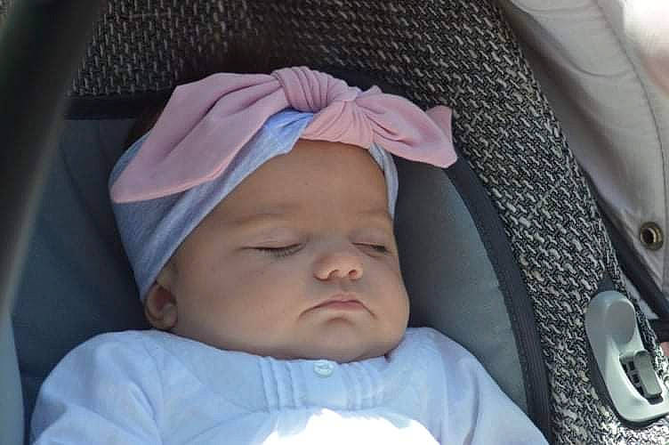 Djoulya participe au concours pour gagner de l'argent avec cette photo : baby, baby_carriage, baby_products, baby_toddler_clothing, cheek, child, chin, comfort, ear, eyebrow, headgear, headwear, iris, linens, lip, mouth, nose, person, product, skin