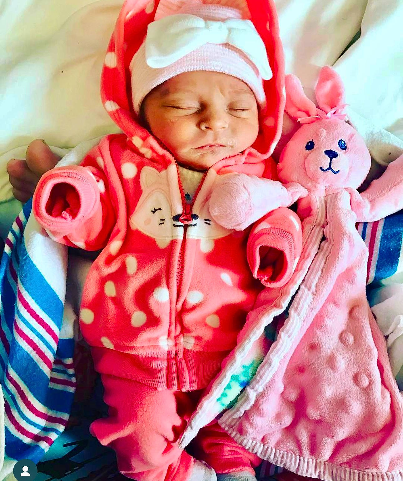 Hayden joined the competition — help win amazing prizes! baby, baby_products, baby_sleeping, baby_toddler_clothing, cap, cheek, child, collar, comfort, fictional_character, happy, headwear, jacket, linens, magenta, pattern, person, pink, skin, sleeve
